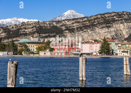 Embankment of the Riva del Garda town on Lake Garda in Italy on a sunny winter day Stock Photo