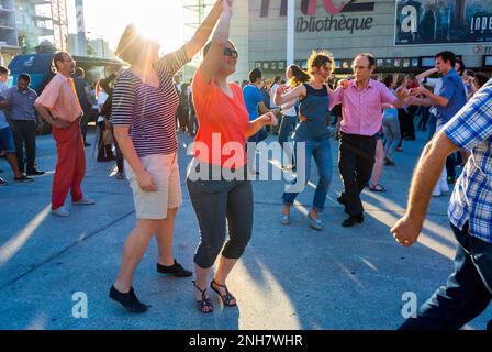 Paris, France, Crowd Young French People Dancing on Street to Rock and Roll Music, Bibliotheque Neighborhood Stock Photo