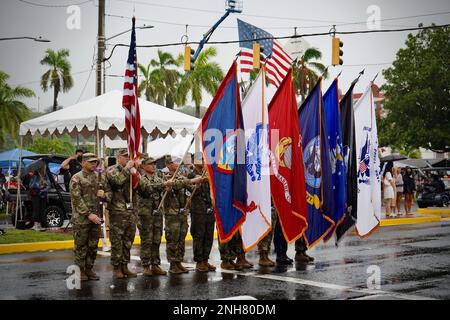 U.S. Coast Guard Forces Micronesia participates in a joint color guard at the annual Liberation day parade down Marine Corps Drive in Guam on July 21, 2022. Liberation Day reminds us of the sacrifice of the people of Guam and the forces who liberated them after 31 months of occupation. The USCGC Tupelo (WLB 303) and 10 Coast Guard-manned Navy warships stood alongside their fellows in Operation Forager —  to liberate the island of Guam from Japanese control. Stock Photo