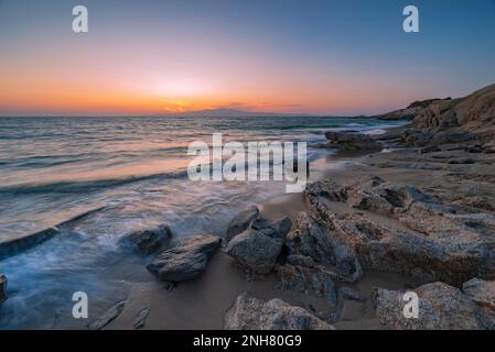 Hawaii beach in the Alikò promontory at dusk, Naxos Stock Photo