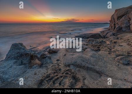 Hawaii beach in the Alikò promontory at dusk, Naxos Stock Photo