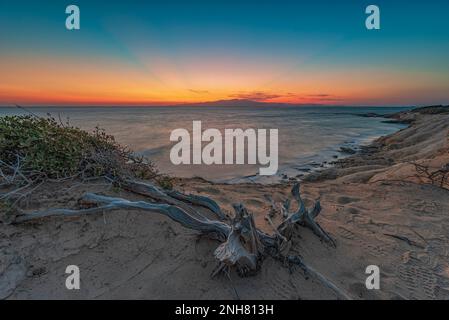 Hawaii beach in the Alikò promontory at dusk, Naxos Stock Photo