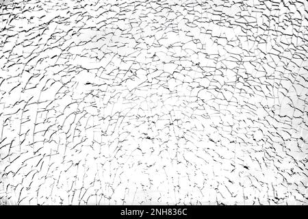 Broken glass with black cracks. Abstract cracked window on white Stock Photo
