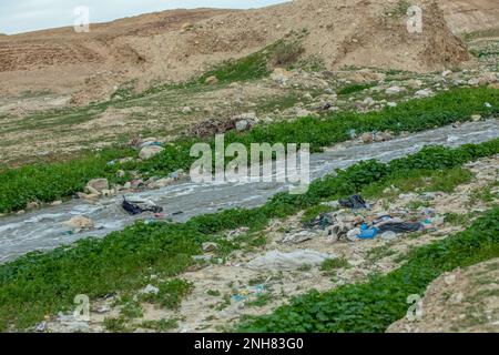 The Kidron Stream flows from Jerusalem to the Dead Sea. cia the west bank and Palestine. The flow in this stream consists mainly of sewerage and waste Stock Photo