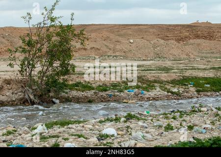 The Kidron Stream flows from Jerusalem to the Dead Sea. cia the west bank and Palestine. The flow in this stream consists mainly of sewerage and waste Stock Photo