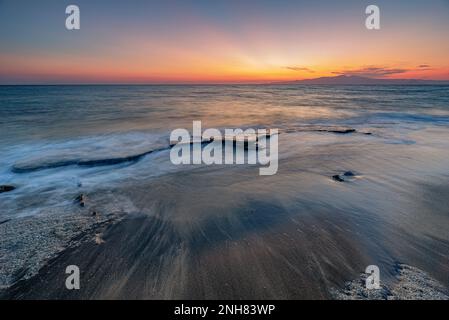 Hawaii beach in the Alikò promontory at dusk, Naxos Stock Photo