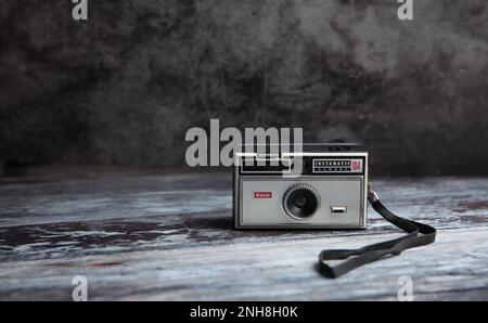 Still life image of Kodak instamatic camera with copy space left Stock Photo