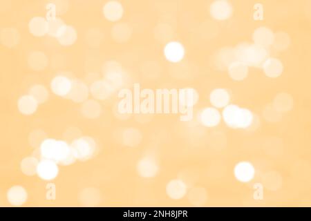 White gold abstract lights. Festive glitter blur Bokeh background. Defocused backdrop. Abstract bokeh lights with soft yellow, peach, gold light backg Stock Photo