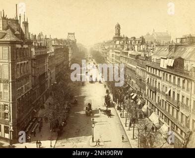 Boulevard des Italiens in Paris, France, late nineteenth century; the The?e?tre Robert-Houdin is in the mid-foreground at right. Stock Photo