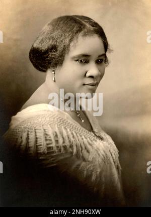 Sarah Breedlove a.k.a. Madam C.J. Walker (1867-1919) was the first female self-made millionaire in America. Walker made her fortune by developing and marketing a line of cosmetics and hair care products for black women through the business she founded, Madam C. J. Walker Manufacturing Company. She became known for her philanthropy and activism. At the time of her death, she was the wealthiest African-American businesswoman and wealthiest self-made black woman in America. Stock Photo
