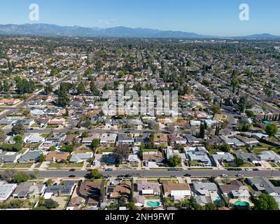 The San Fernando Valley, located in northern section of greater Los Angeles, California is shown from an aerial view during an afternoon day. Stock Photo