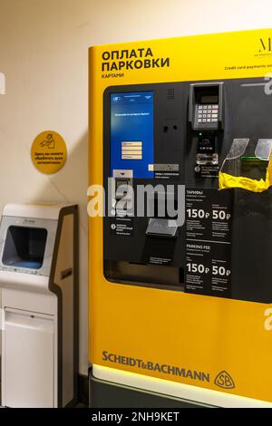 Moscow, Russia - February 13, 2023: parking payment machine in underground garage of shopping mall Stock Photo