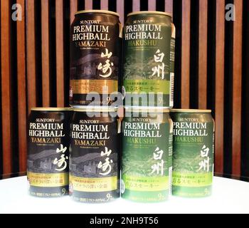 Cans of new highball are pictured during a press conference in