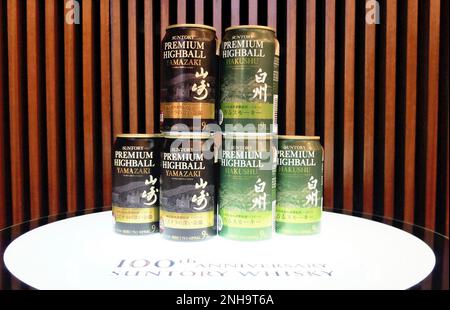 Cans of new highball are pictured during a press conference in