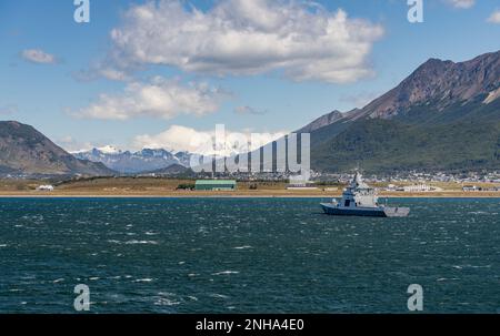 Ushuaia, Argentina - 28 January 2023: Navy frigate at anchor by the airport Stock Photo