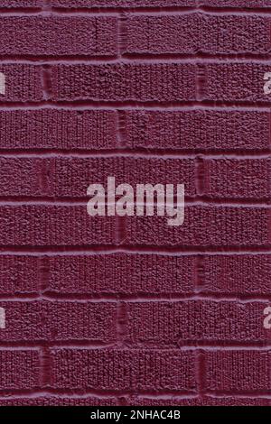 Painted burgundy brick wall texture vertical background. Stock Photo