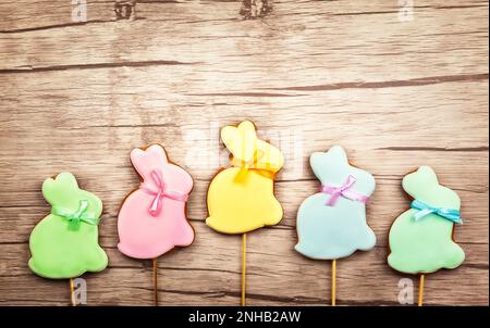 Easter composition with  easter cookies on wooden background. Easter concept with copy space. Flat lay, top view. Stock Photo