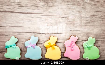 Easter composition with  easter cookies on wooden background. Easter concept with copy space. Flat lay, top view. Stock Photo