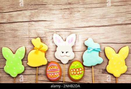 Easter composition with  easter cookies on wooden background. Easter concept with copy space. Flat lay, top view. Stock Photo
