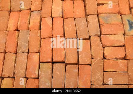 In the pile is a ready-made fired brick made of clay Stock Photo