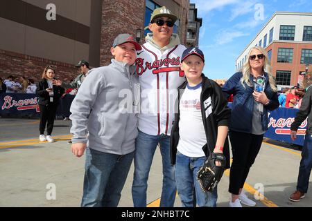 ATLANTA, GA - JANUARY 21: Braves coach Eric Young, Sr. talks to a young fan  during the 2023 Braves Fest on January 21, 2023 at The Battery and Truist  Park in Atlanta