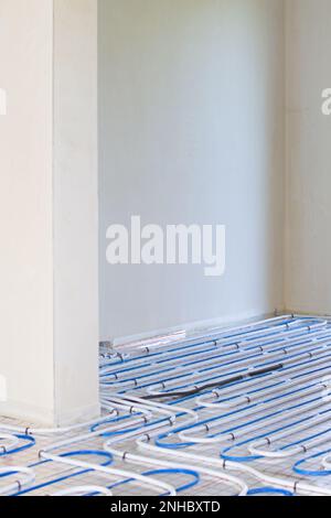 Underfloor heating system installation.  Individual Heating. Stock Photo