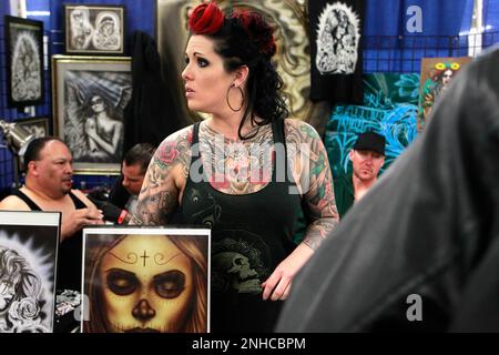 jen baker of evolution tattoo in reno nv shows her tattoos during the body art expo at the cow palace on saturday march 24 2012 in san francisco ca michael macorsan francisco chronicle via ap 2nhcbpm