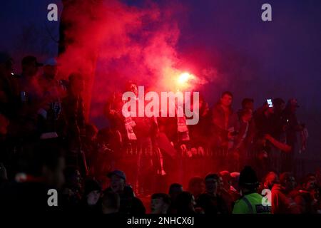 Liverpool, UK. 21st Feb, 2023. Liverpool fans let off red flares as they wait for the team bus to arrive. UEFA Champions league, round of 16 1st leg match, Liverpool v Real Madrid at Anfield Stadium in Liverpool on Tuesday 21st February 2023. this image may only be used for Editorial purposes. Editorial use only, license required for commercial use. No use in betting, games or a single club/league/player publications. pic by Chris Stading/Andrew Orchard sports photography/Alamy Live news Credit: Andrew Orchard sports photography/Alamy Live News Stock Photo