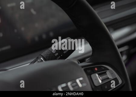 Moscow, Russia - December 18, 2021 Car wiper adjustment lever. Wipers switch control. Windscreen wipers select buttons, Stock Photo