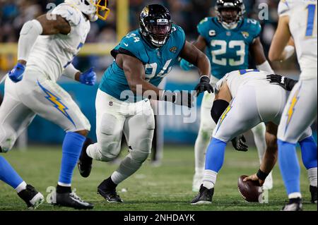 January 7, 2023: Tennessee Titans quarterback Joshua Dobbs (11) is sacked  by Jacksonville Jaguars defensive end Roy Robertson-Harris (95) during a  game in Jacksonville, FL. Romeo T Guzman/CSM/Sipa USA.(Credit Image: © Romeo