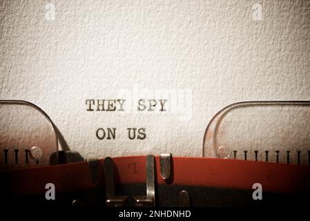 They spy on us text written with a typewriter. Stock Photo