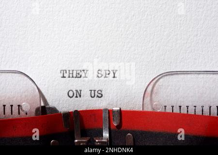 They spy on us text written with a typewriter. Stock Photo
