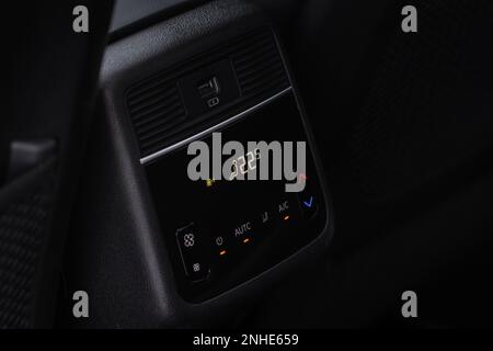 Modern car. Digital second row seat temperature control. Car air