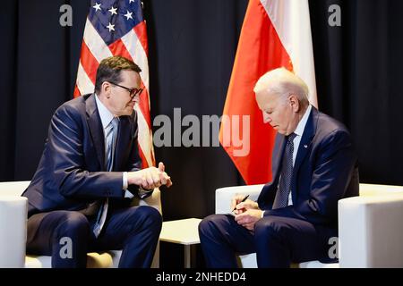 Warsaw, Poland. 21st Feb, 2023. US President Joe Biden (R) mett with Poland's Prime Minister, Mateusz Morawiecki (L) during a welcoming ceremony ahead of their meeting at the Presidential Palace in Warsawon Tuesday, February 21, 2023. Photo by Polish PM Press Office/UPI Credit: UPI/Alamy Live News Stock Photo