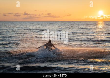 golden hour, peaceful, freedom, healthy, adventure, male, amazing, stunning, holidays, destinations, alone, awesome, shallow, wave, recreation, active Stock Photo