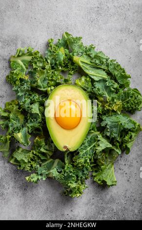 Fresh Cut Avocado With Heart Shaped Pit Area On Wooden Cutting Board  16444609 Stock Photo at Vecteezy