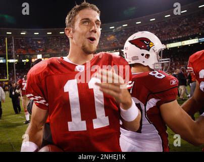 San Francisco Forty Niners quarterback Tim Rattay feels the pressure of St.  Louis Rams Damione Lewis, #92 and Leonard Littlel in the 2nd quarter of  their game at Monster Park in San