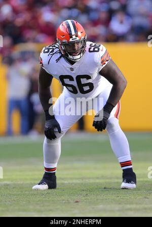 Cleveland Browns offensive tackle James Hudson III (66) walks back to the  line of scrimmage during