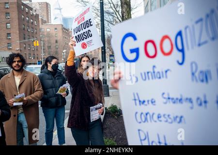 YouTube workers and supporters rally outside of the Google building in Chelsea in New York on Tuesday, February 21, 2023 in support of striking YouTube Music workers. The YouTube Music Content Operations team, formally employed by a third-party Cognizant, filed for a union election in the Alphabet Workers Union and claim that they were retaliated against, including a back-to-office mandate. (© Richard B. Levine) Stock Photo