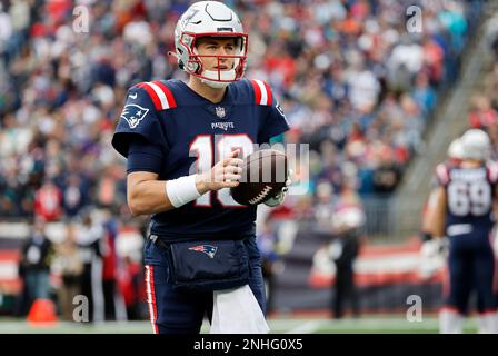 FOXBOROUGH, MA - JANUARY 01: New England Patriots defensive tackle Carl  Davis (98) and defensive end Christian Barmore (90) celebrate a stop during  a game between the New England Patriots and the