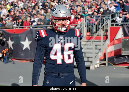 FOXBOROUGH, MA - JANUARY 01: New England Patriots defensive tackle Carl  Davis (98) and defensive end Christian Barmore (90) celebrate a stop during  a game between the New England Patriots and the