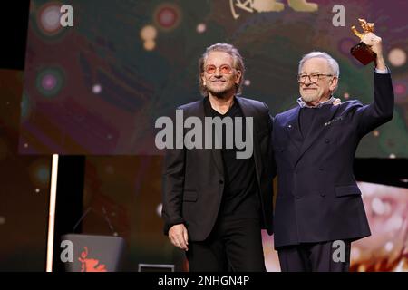 „U2“ Singer Bono and Steven Spielberg seen on stage at Honorary Golden Bear Award and homage for Steven Spielberg during the 73rd Berlinale Internatio Stock Photo