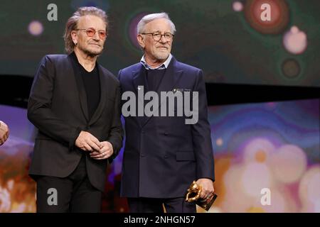 „U2“ Singer Bono and Steven Spielberg seen on stage at Honorary Golden Bear Award and homage for Steven Spielberg during the 73rd Berlinale Internatio Stock Photo