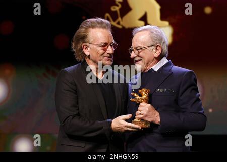 „U2“ Singer Bono and Steven Spielberg seen on stage at Honorary Golden Bear Award and homage for Steven Spielberg during the 73rd Berlinale Internatio Stock Photo