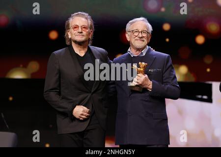 „U2“ Singer Bono and Steven Spielberg seen on stage at Honorary Golden Bear Award and homage for Steven Spielberg during the 73rd Berlinale Internatio Stock Photo