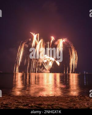 Weymouth fireworks on seafront during summer in night Stock Photo