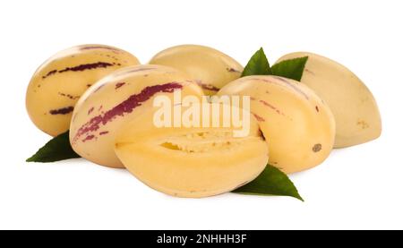 Fresh ripe pepino melons with green leaves on white background Stock Photo