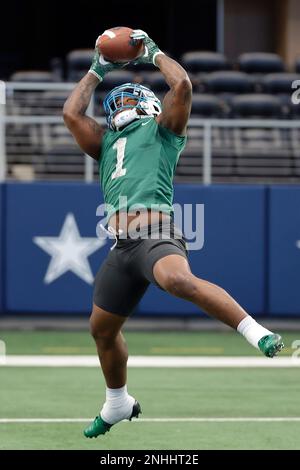 Oxford, MS, USA. 18th Sep, 2021. Ole' Miss running back Jerrion Ealy (9)  slips the tackle of Tulane linebacker Nick Anderson (1), defense during the  NCAA football game between the Tulane Green