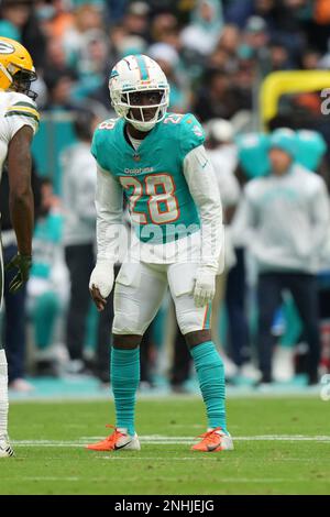 MIAMI GARDENS, FL - DECEMBER 25: Miami Dolphins cornerback Kader Kohou (28)  eyes the quarterback from the line of scrimmage during the game between the  Green Bay Packers and the Miami Dolphins