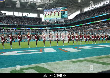 Packers wear Christmas suits to North Carolina